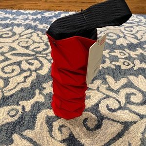 Built red origami wine tote with black strap and interior